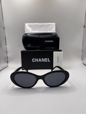 CHANEL Black Oval Sunglasses – Elegant Designer Women’s Shades